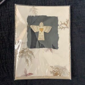 Silver angel pin with gold tone heart